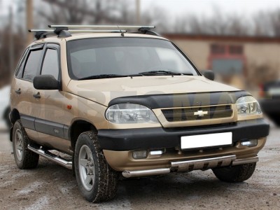Пороги труба с накладками 76 мм Технотек для Chevrolet Niva 2009-2020