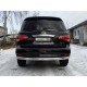 Защита заднего бампера овальная 75х42 мм ТСС для Infiniti QX56 2010-2013